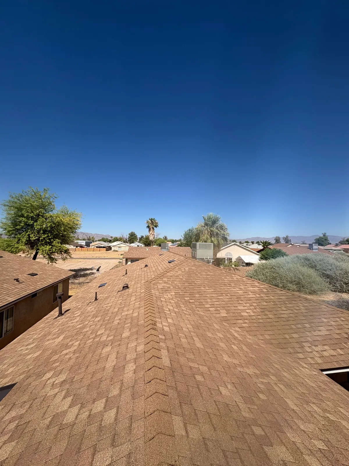 Brown shingle roof in Lake Havasu City inspected by SJ Roofing LLC